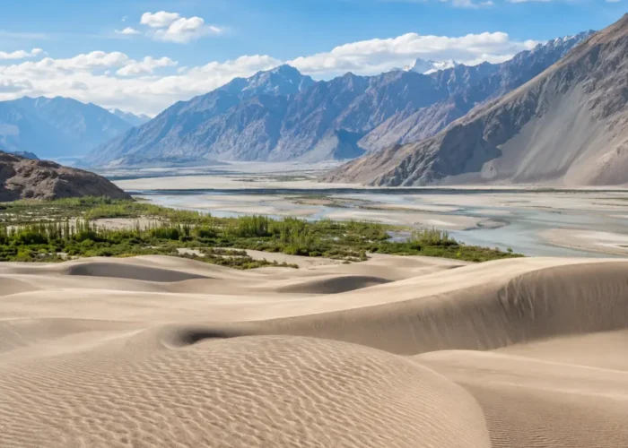 Ultra-realistic Nubra Valley landscape with Hunder sand dunes, green oasis, river channels, and rugged Ladakh mountains.