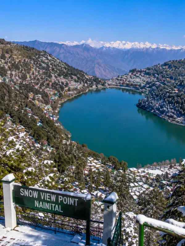 Bright morning view from Snow View Point in Nainital with Himalayan peaks, green hills, and clear mountain scenery