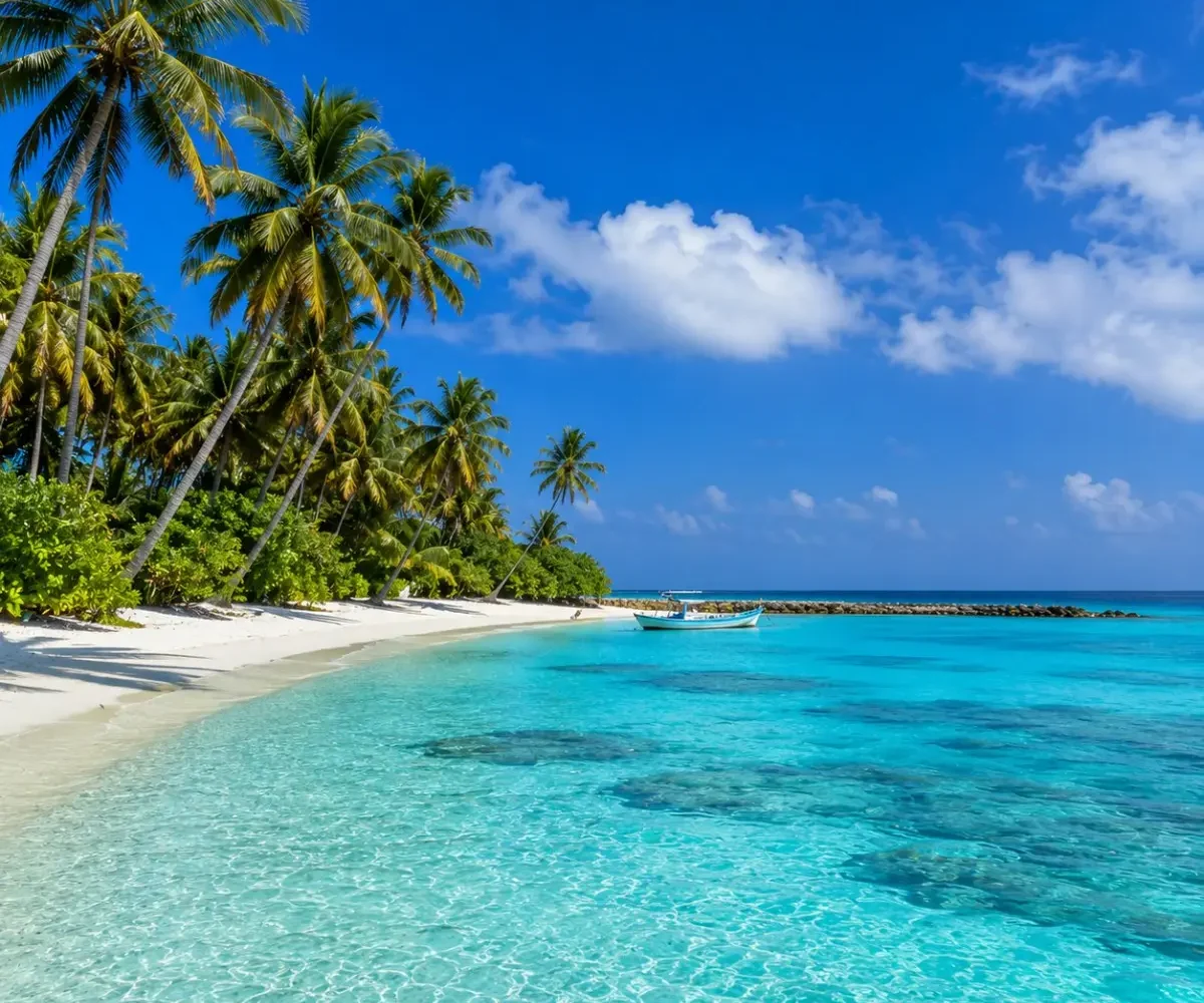 Lakshadweep Island Tour Package (4N/5D) featuring pristine beaches, turquoise lagoons, coral reefs, water sports and tropical island landscapes.