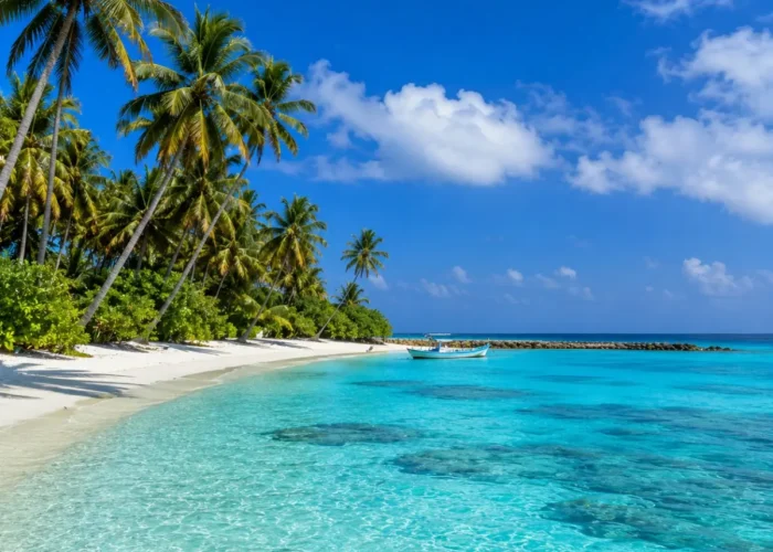 Lakshadweep Island Tour Package (4N/5D) featuring pristine beaches, turquoise lagoons, coral reefs, water sports and tropical island landscapes.