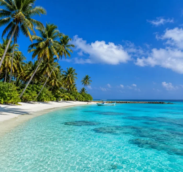 Lakshadweep Island Tour Package (4N/5D) featuring pristine beaches, turquoise lagoons, coral reefs, water sports and tropical island landscapes.