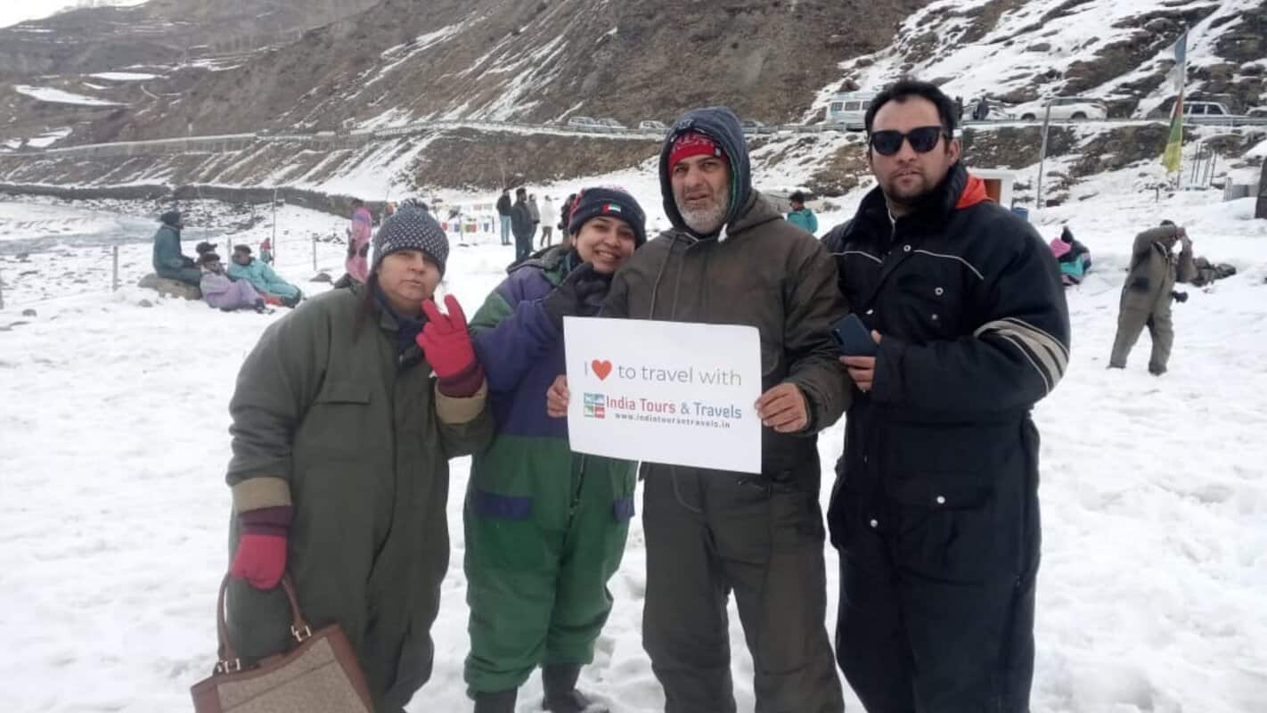 Refreshing winter mountain tour in India with family, snowy landscape, and adventure travel in India Tours & Travels. Experience the scenic Himalayas and snowy terrains on your trip.