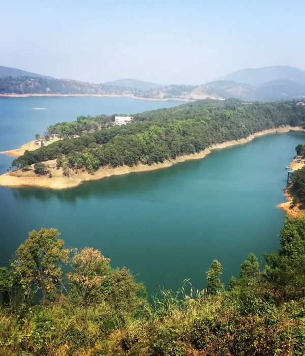 Assam Meghalaya Highlights Package with scenic lake, forested island, rolling hills and peaceful Northeast India landscape