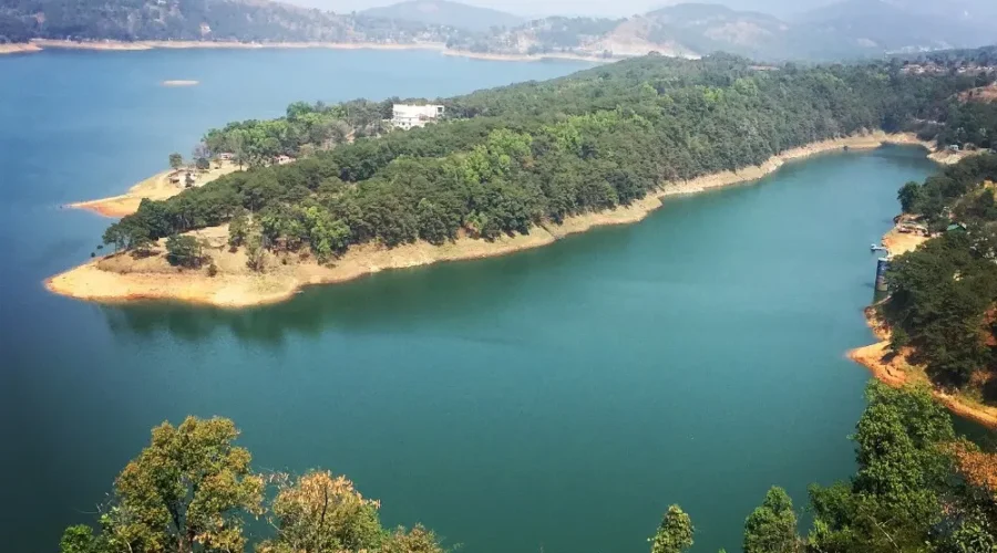 Assam Meghalaya Highlights Package with scenic lake, forested island, rolling hills and peaceful Northeast India landscape