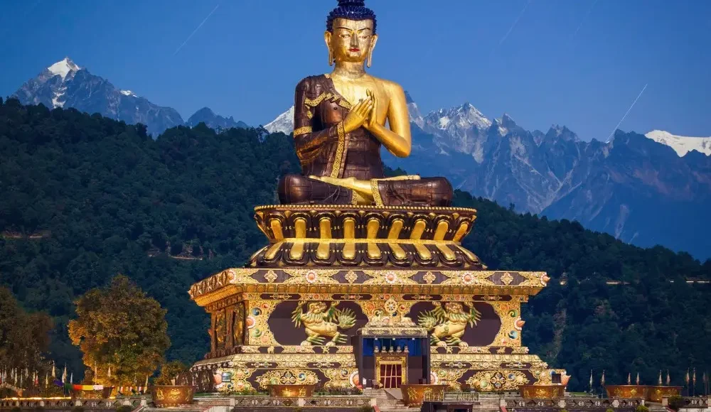 Gangtok Darjeeling package with giant Buddha statue, Himalayan hills, scenic landscape and peaceful mountain tourism view