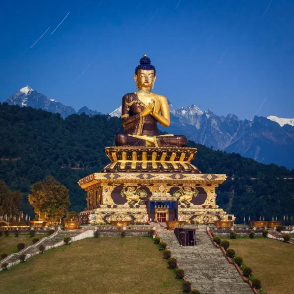 Gangtok Darjeeling package with giant Buddha statue, Himalayan hills, scenic landscape and peaceful mountain tourism view