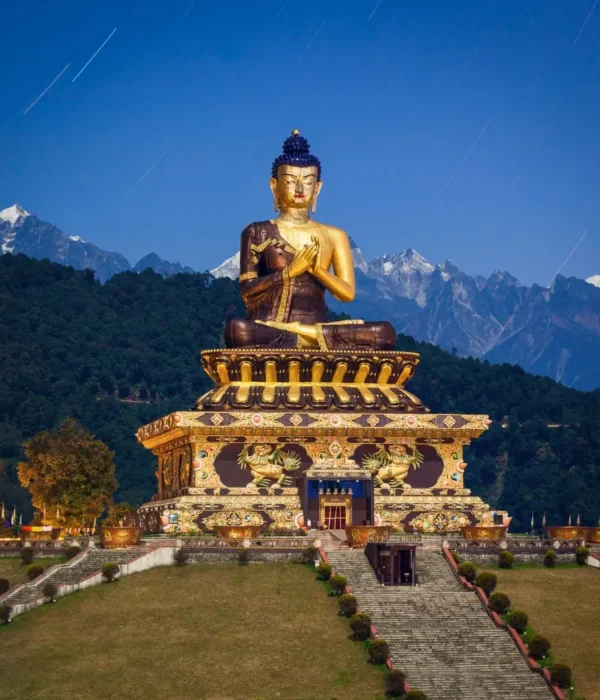 Gangtok Darjeeling package with giant Buddha statue, Himalayan hills, scenic landscape and peaceful mountain tourism view