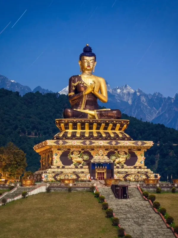 Gangtok Darjeeling package with giant Buddha statue, Himalayan hills, scenic landscape and peaceful mountain tourism view