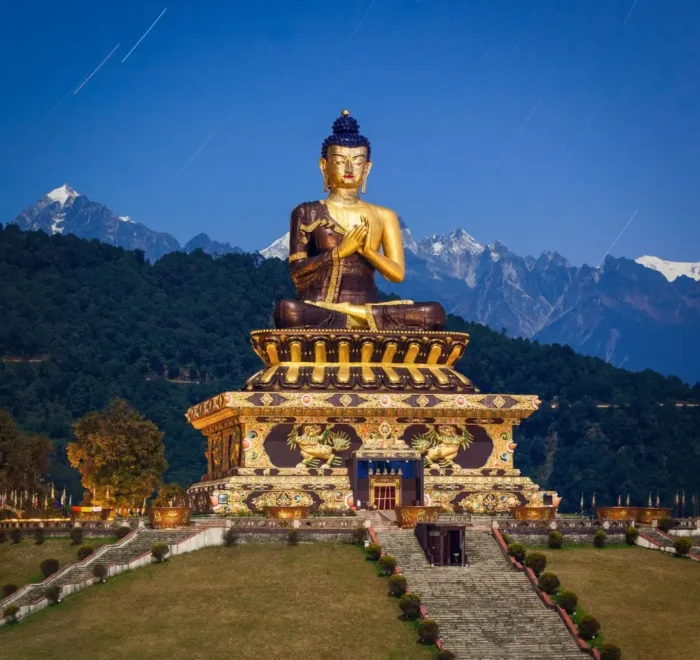 Gangtok Darjeeling package with giant Buddha statue, Himalayan hills, scenic landscape and peaceful mountain tourism view