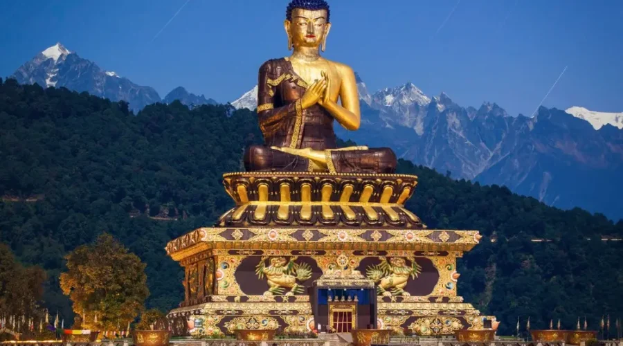 Gangtok Darjeeling package with giant Buddha statue, Himalayan hills, scenic landscape and peaceful mountain tourism view