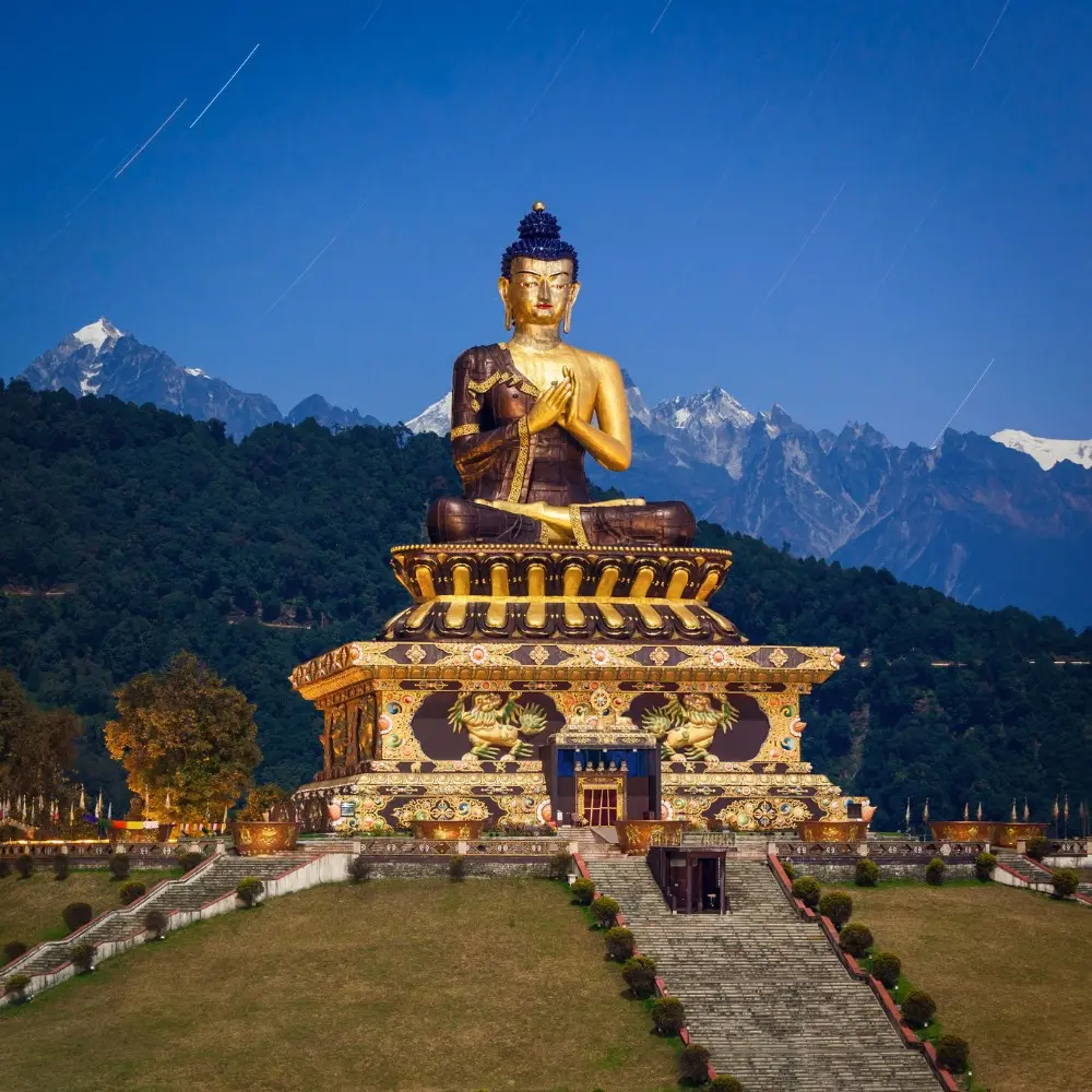 Gangtok Darjeeling package with giant Buddha statue, Himalayan hills, scenic landscape and peaceful mountain tourism view
