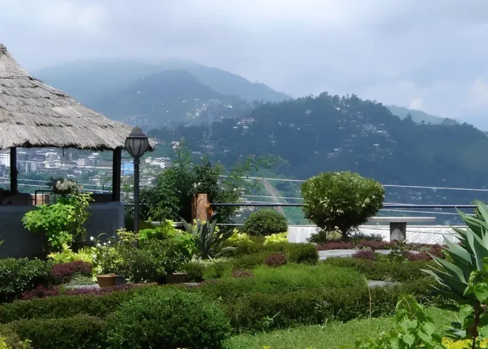 Gangtok Kalimpong Darjeeling package with scenic hill garden, misty mountains, lush greenery and peaceful Himalayan views
