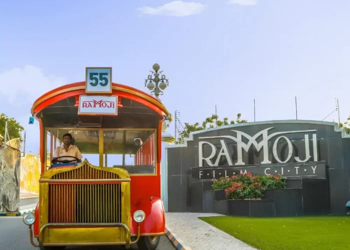 Hyderabad Family Fun Package featuring Ramoji Film City vintage bus, entrance view and family entertainment attraction