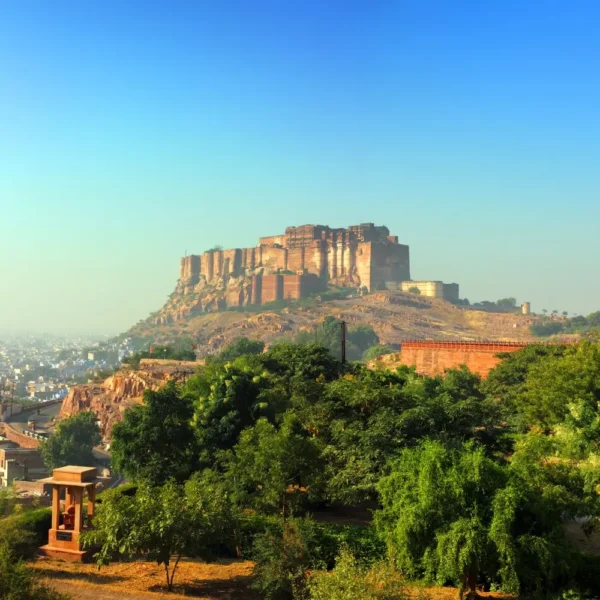 Jaipur Jodhpur Udaipur package featuring Mehrangarh Fort, heritage architecture and scenic Rajasthan city landscape