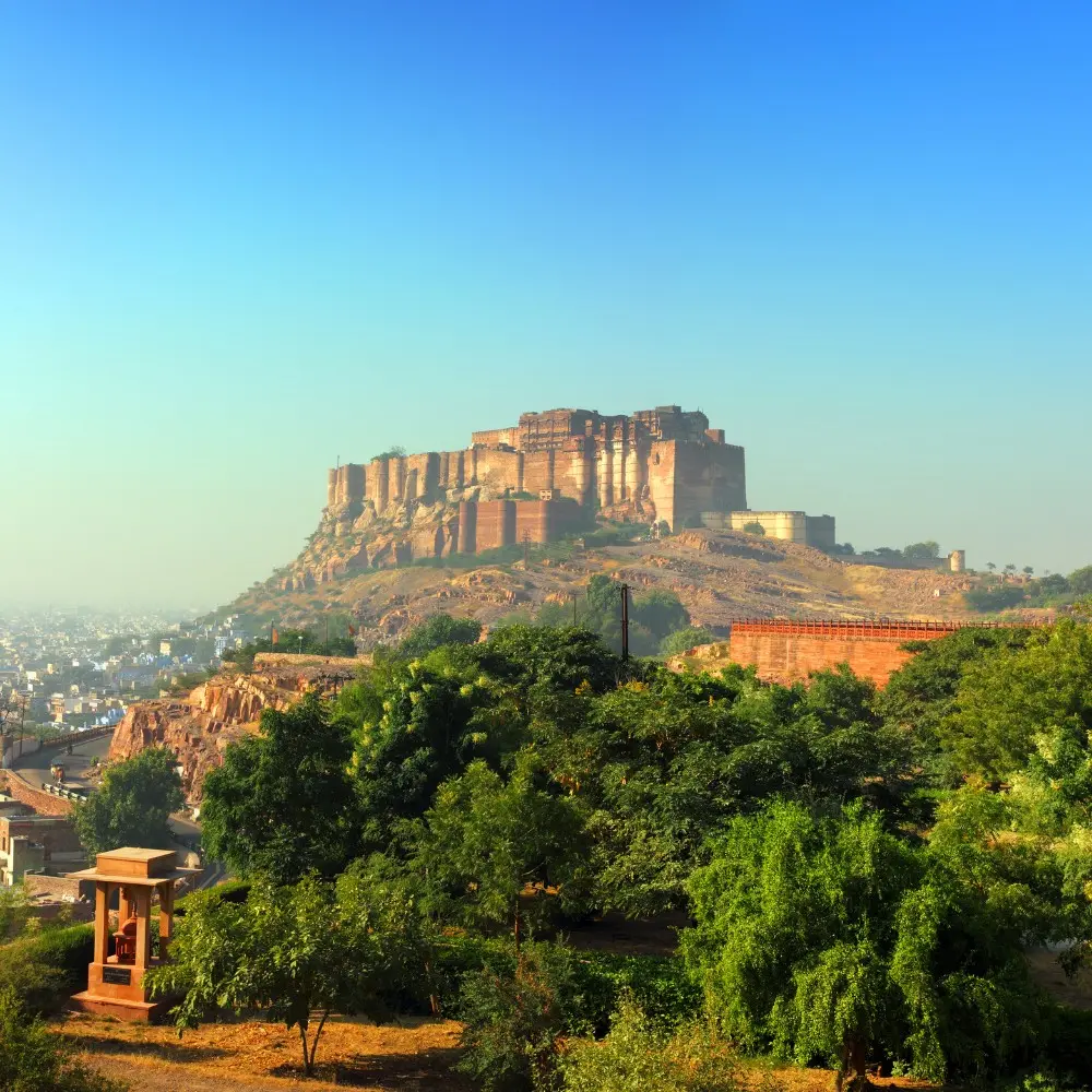 Jaipur Jodhpur Udaipur package featuring Mehrangarh Fort, heritage architecture and scenic Rajasthan city landscape