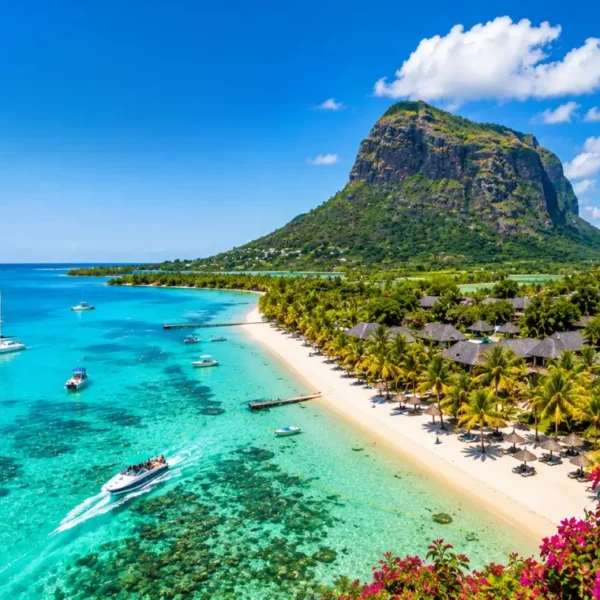 Mauritius tropical beach with turquoise lagoon, luxury shoreline and Le Morne mountain in bright daylight