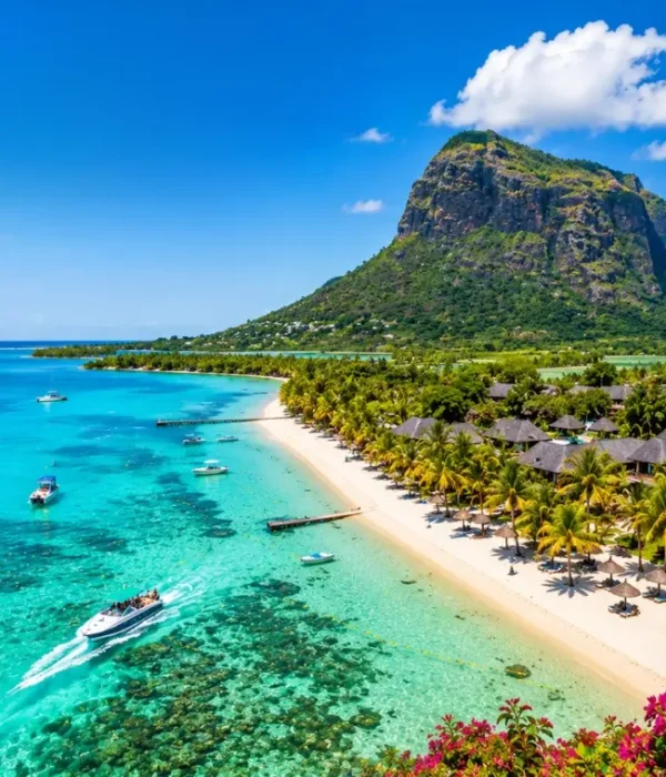 Mauritius tropical beach with turquoise lagoon, luxury shoreline and Le Morne mountain in bright daylight