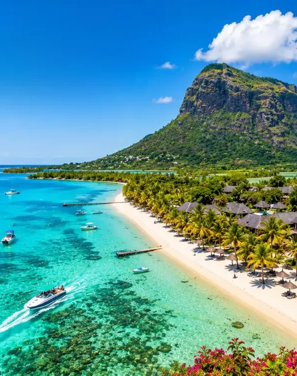 Mauritius tropical beach with turquoise lagoon, luxury shoreline and Le Morne mountain in bright daylight