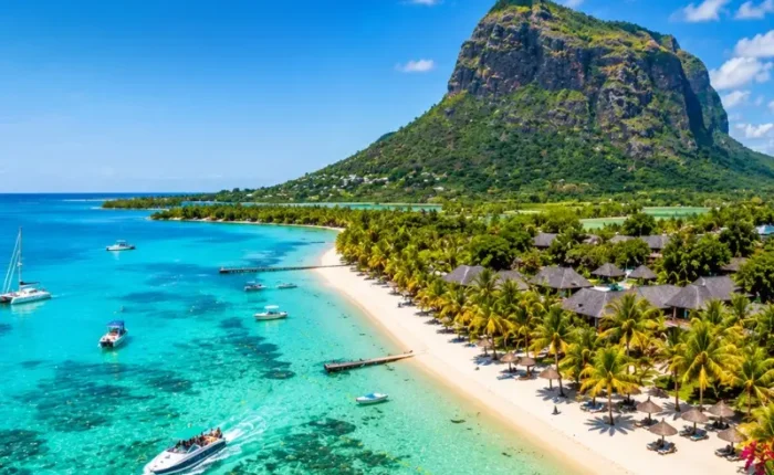 Mauritius tropical beach with turquoise lagoon, luxury shoreline and Le Morne mountain in bright daylight