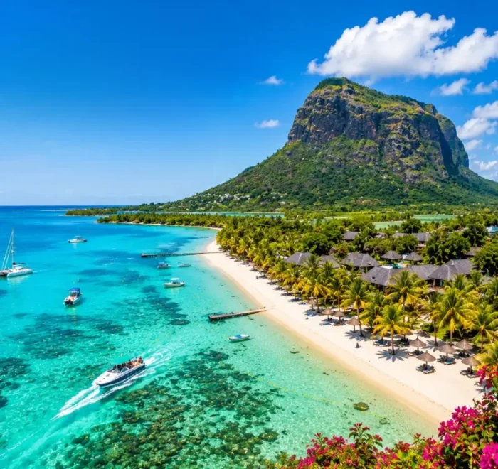 Mauritius tropical beach with turquoise lagoon, luxury shoreline and Le Morne mountain in bright daylight