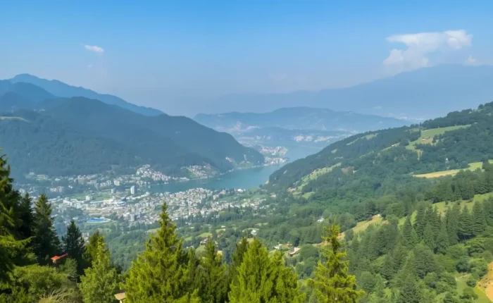 Scenic view of Nainital with green hills, pine forest, lake valley and peaceful Uttarakhand mountain landscape