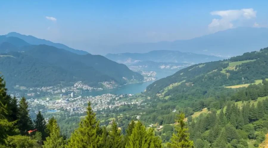 Scenic view of Nainital with green hills, pine forest, lake valley and peaceful Uttarakhand mountain landscape