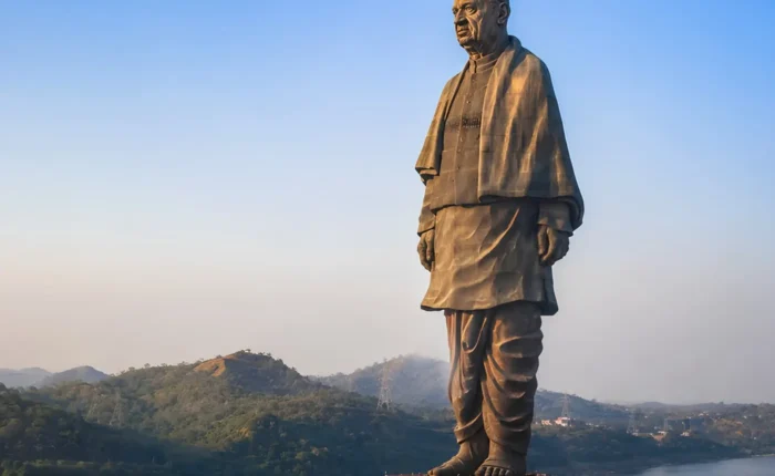 Statue of Unity in Kevadia Gujarat overlooking the Narmada River with scenic hills and iconic monument view
