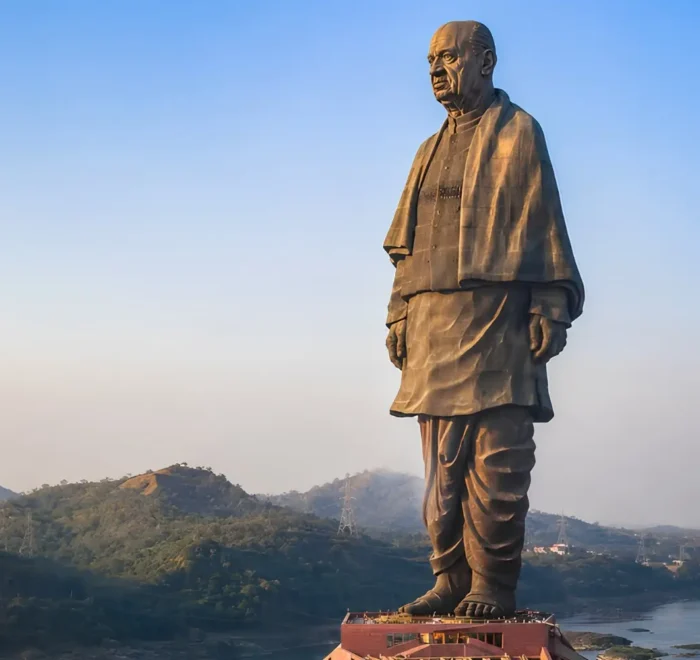 Statue of Unity in Kevadia Gujarat overlooking the Narmada River with scenic hills and iconic monument view