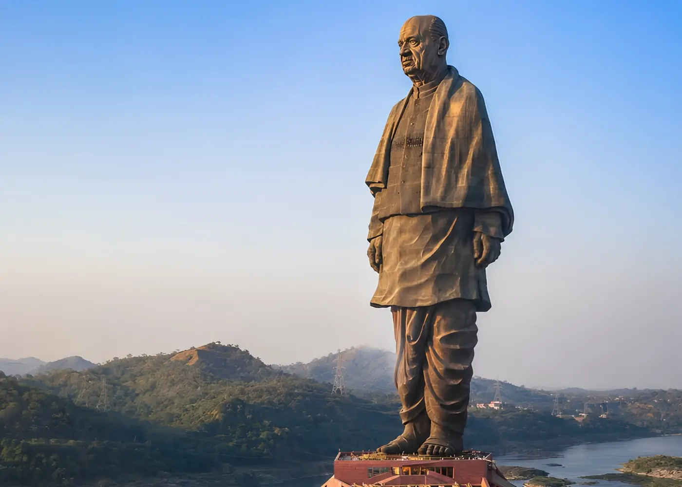 Statue of Unity in Kevadia Gujarat overlooking the Narmada River with scenic hills and iconic monument view