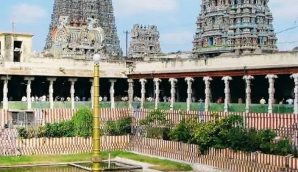 Tamil Nadu Temple Circuit tour image featuring a traditional South Indian temple complex with ornate gopurams and sacred temple tank.