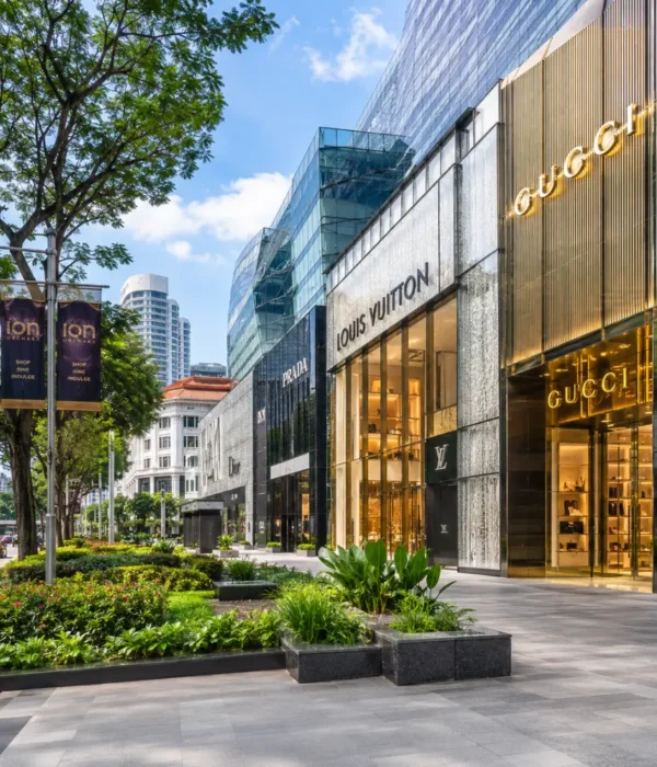 Luxury shopping street in Singapore with Marina Bay style skyline, designer stores, and bright morning atmosphere.