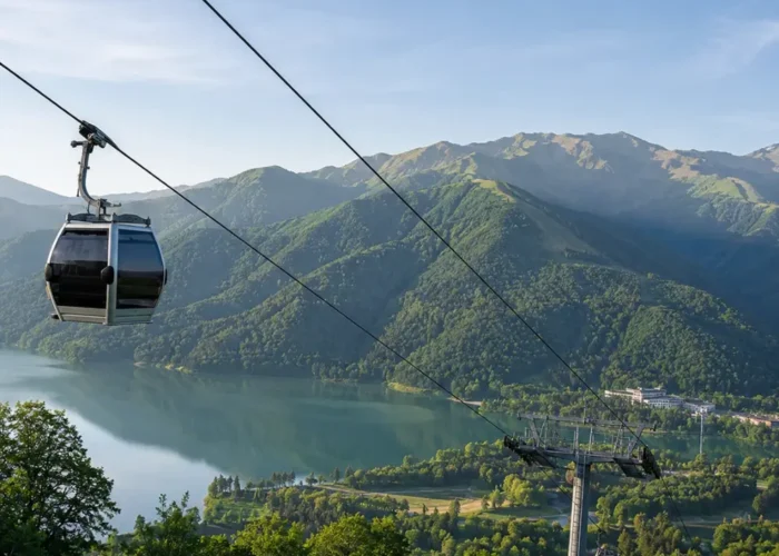 Gabala Azerbaijan mountain landscape with cable car, green valleys, calm lake, and bright morning atmosphere