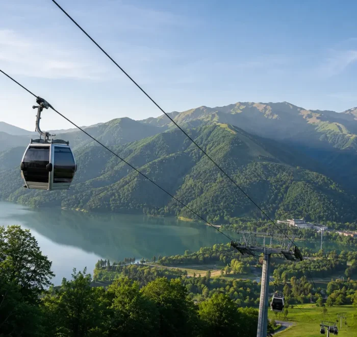 Gabala Azerbaijan mountain landscape with cable car, green valleys, calm lake, and bright morning atmosphere