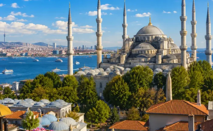 Istanbul skyline with Hagia Sophia, Blue Mosque, Bosphorus views, historic domes, and bright morning atmosphere