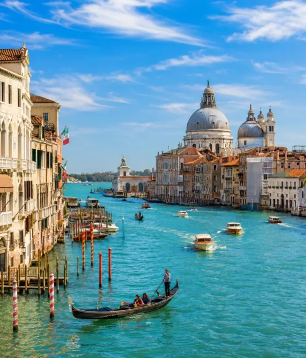Venice city tour with Grand Canal, gondolas, historic bridges, colorful buildings, and bright morning atmosphere.