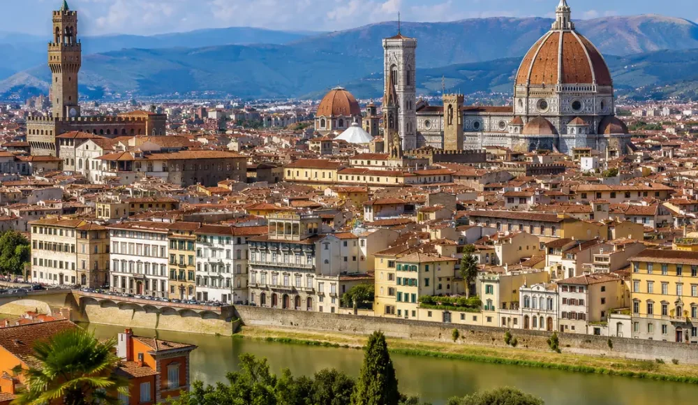 Florence Italy with Duomo cathedral, historic rooftops, Arno River views, and bright morning European atmosphere.