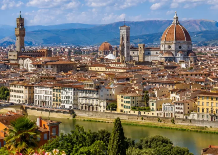 Florence Italy with Duomo cathedral, historic rooftops, Arno River views, and bright morning European atmosphere.