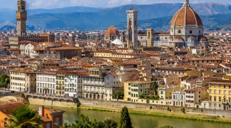 Florence Italy with Duomo cathedral, historic rooftops, Arno River views, and bright morning European atmosphere.