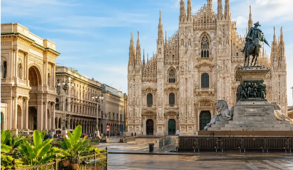Milan Italy with Duomo Cathedral, elegant city square, luxury shopping streets, and bright morning atmosphere.