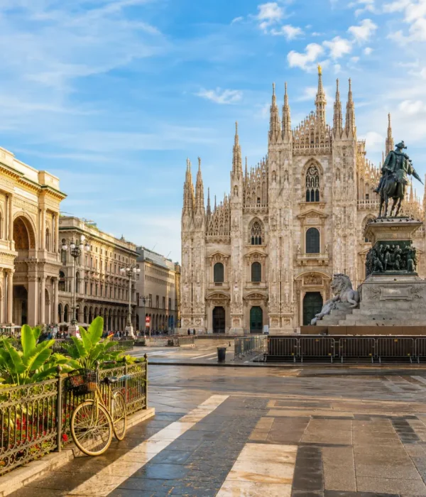 Milan Italy with Duomo Cathedral, elegant city square, luxury shopping streets, and bright morning atmosphere.