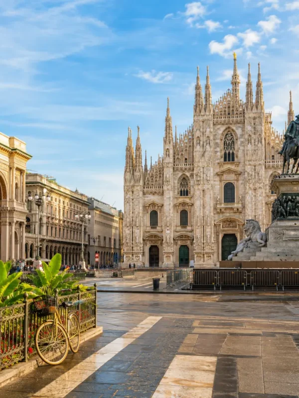 Milan Italy with Duomo Cathedral, elegant city square, luxury shopping streets, and bright morning atmosphere.