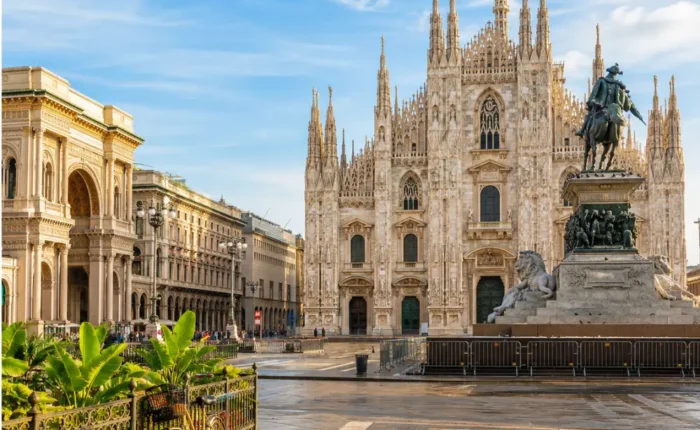 Milan Italy with Duomo Cathedral, elegant city square, luxury shopping streets, and bright morning atmosphere.