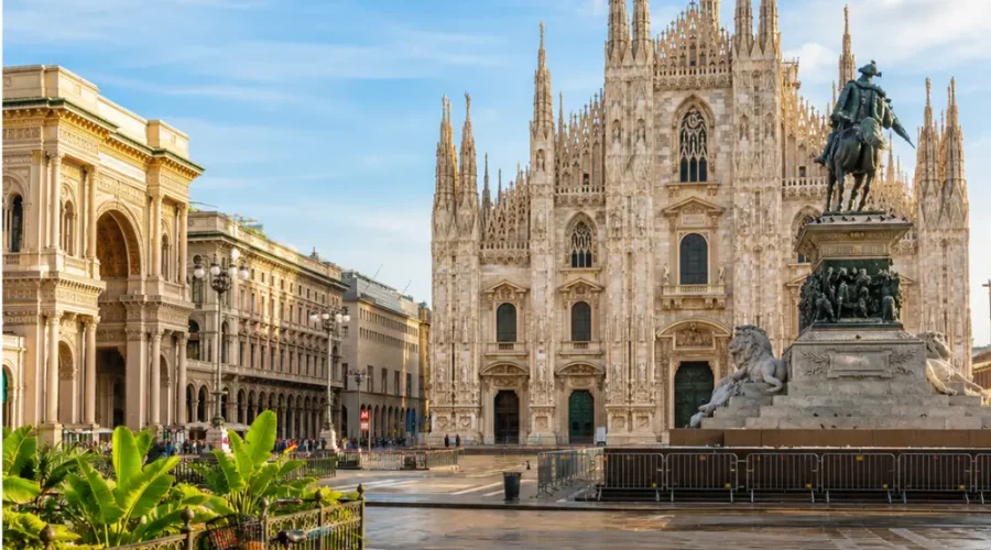 Milan Italy with Duomo Cathedral, elegant city square, luxury shopping streets, and bright morning atmosphere.