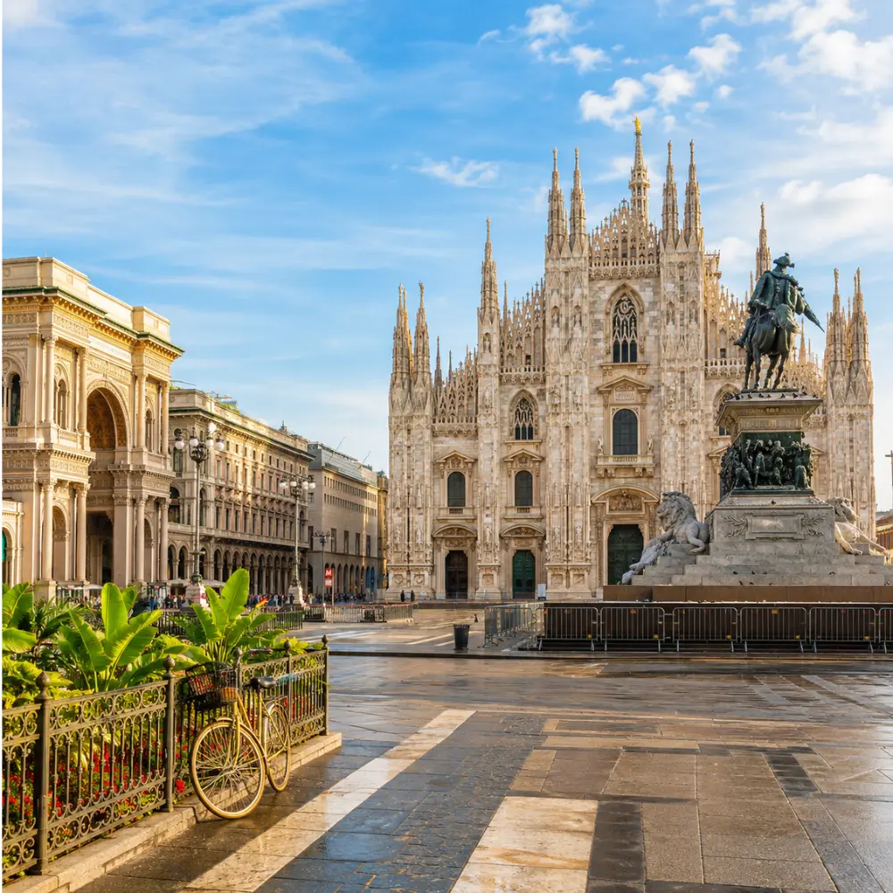 Milan Italy with Duomo Cathedral, elegant city square, luxury shopping streets, and bright morning atmosphere.