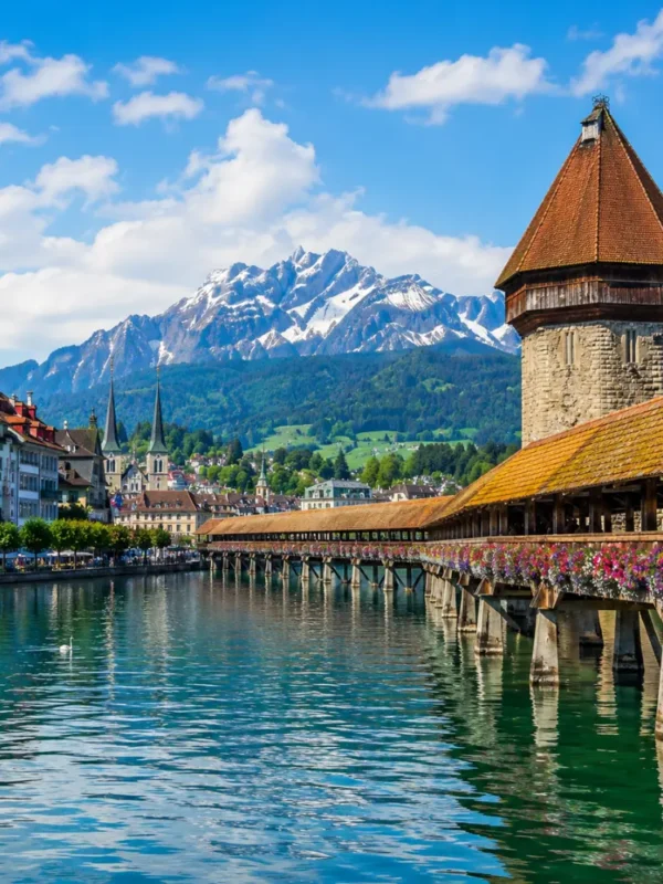 Lucerne city tour with Chapel Bridge, Lake Lucerne, Swiss Alps, historic buildings, and bright morning atmosphere.