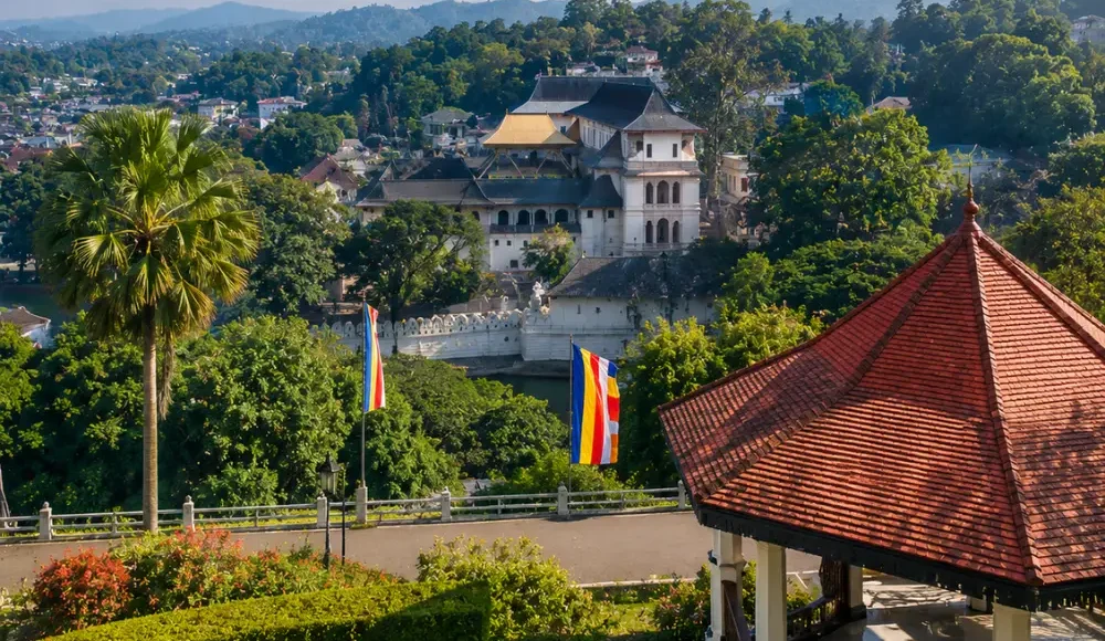 Kandy Sri Lanka with luxury hill resort, tea gardens, misty green mountains, and bright morning tropical atmosphere.