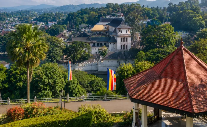Kandy Sri Lanka with luxury hill resort, tea gardens, misty green mountains, and bright morning tropical atmosphere.