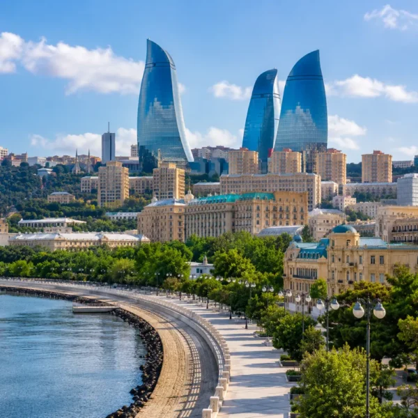 Baku city skyline with Flame Towers, Caspian Sea Boulevard, modern architecture, and bright morning atmosphere.