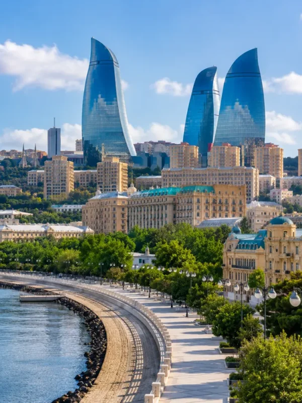 Baku city skyline with Flame Towers, Caspian Sea Boulevard, modern architecture, and bright morning atmosphere.