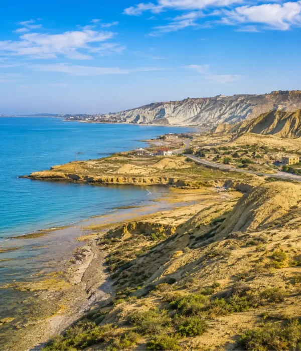 Absheron Peninsula in Azerbaijan with Ateshgah fire temple, rocky landscape, clear sky, and bright morning light.